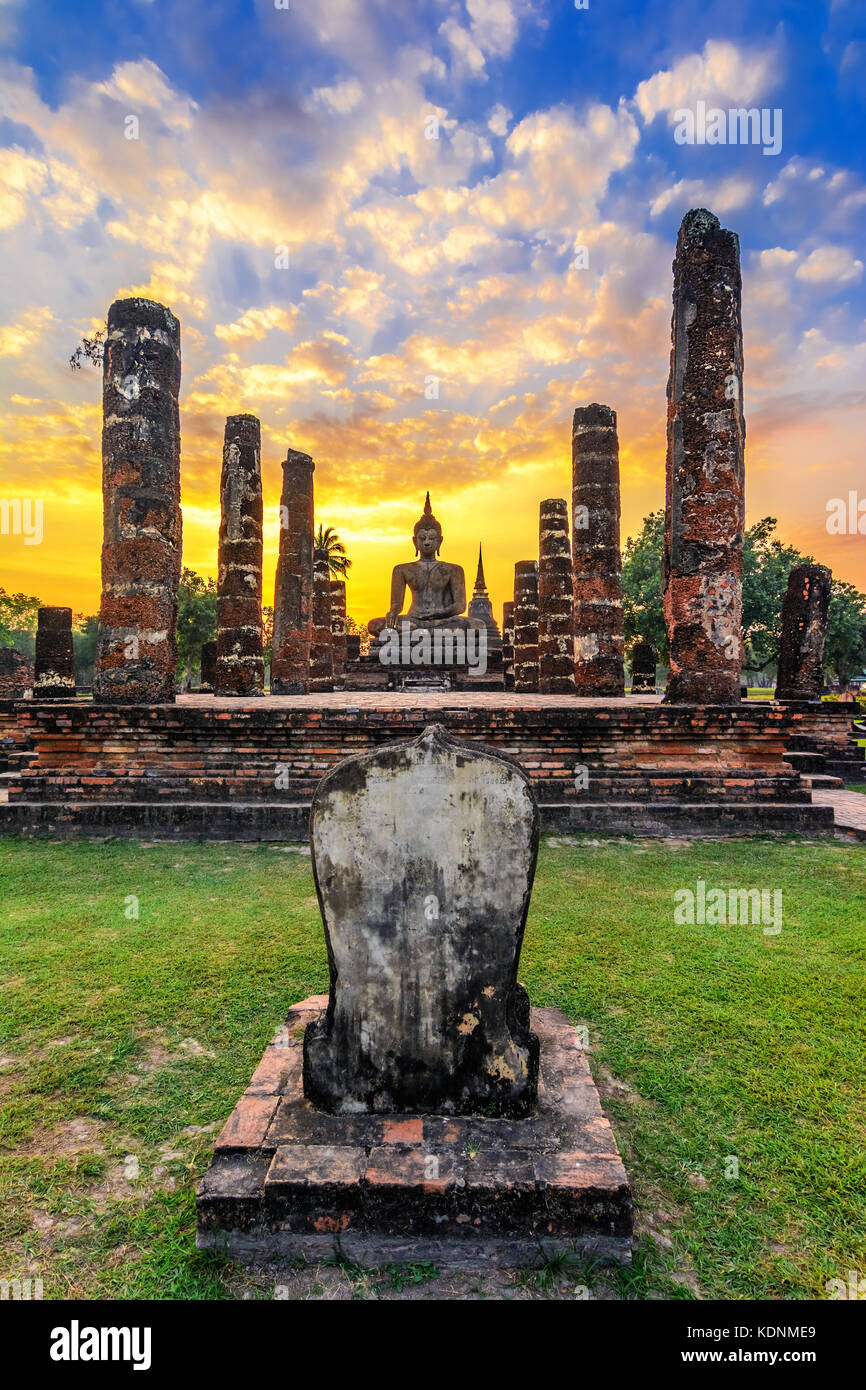 Sitting Budha in Wat Mahathat, historical park which covers the ruins of the old city of Sukhothai, Thailand Stock Photo