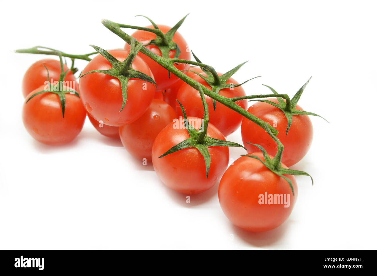 Red cherry tomato isolated on white background Stock Photo - Alamy