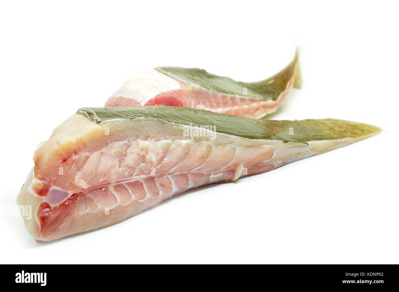 Raw stingray meat isolated on white background Stock Photo - Alamy