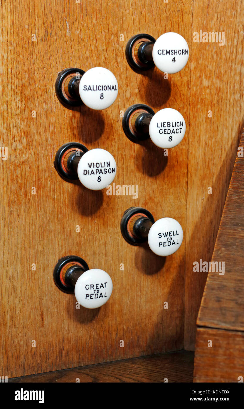 A view of stops on a church organ at Ringland, Norfolk, England, United Kingdom. Stock Photo