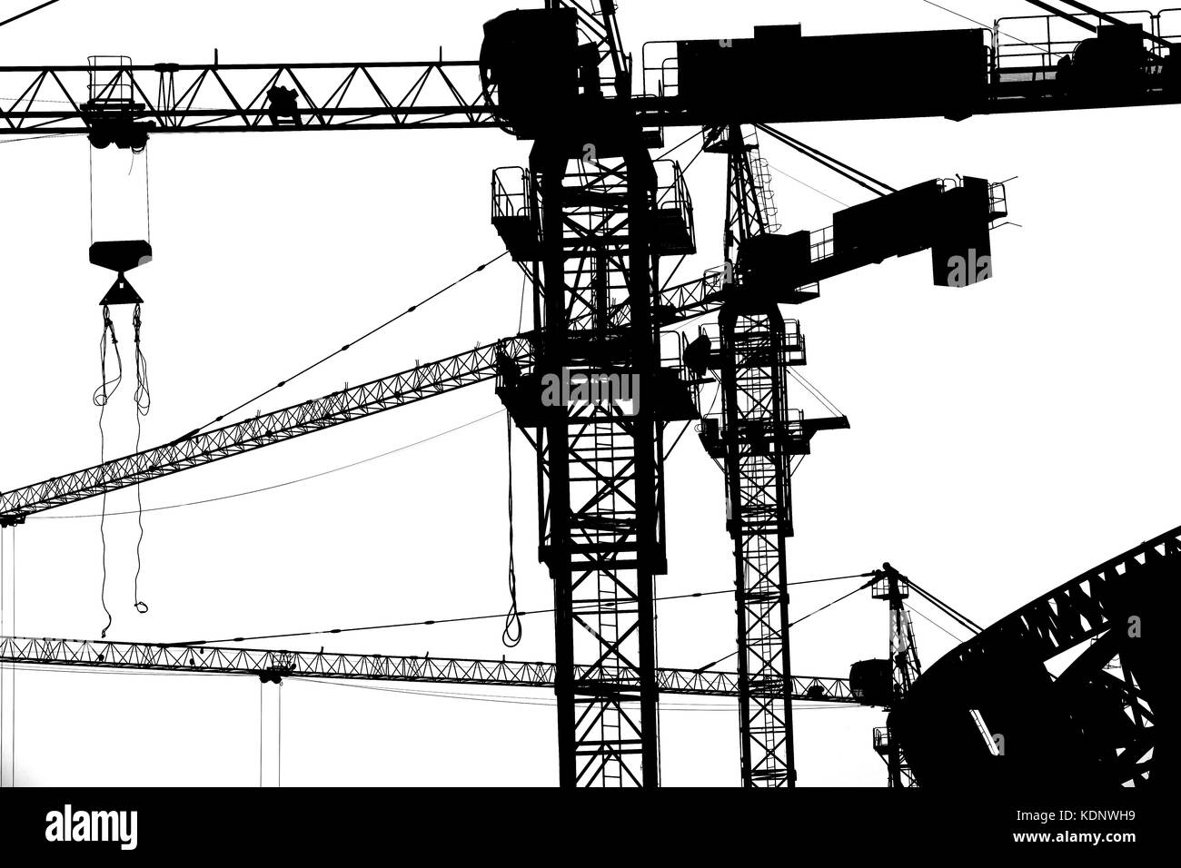 black hoisting crane isolate on white background Stock Photo - Alamy