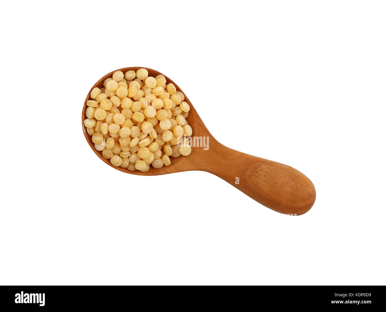 Traditional ptitim pasta (Israeli or pearl couscous) in wooden scoop isolated on white background, close up, elevated top view Stock Photo