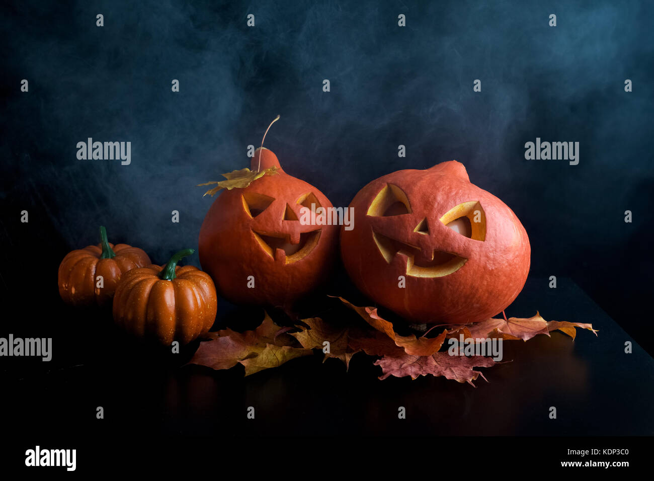 Halloween pumpkins heads jack lantern on dark background Stock Photo ...