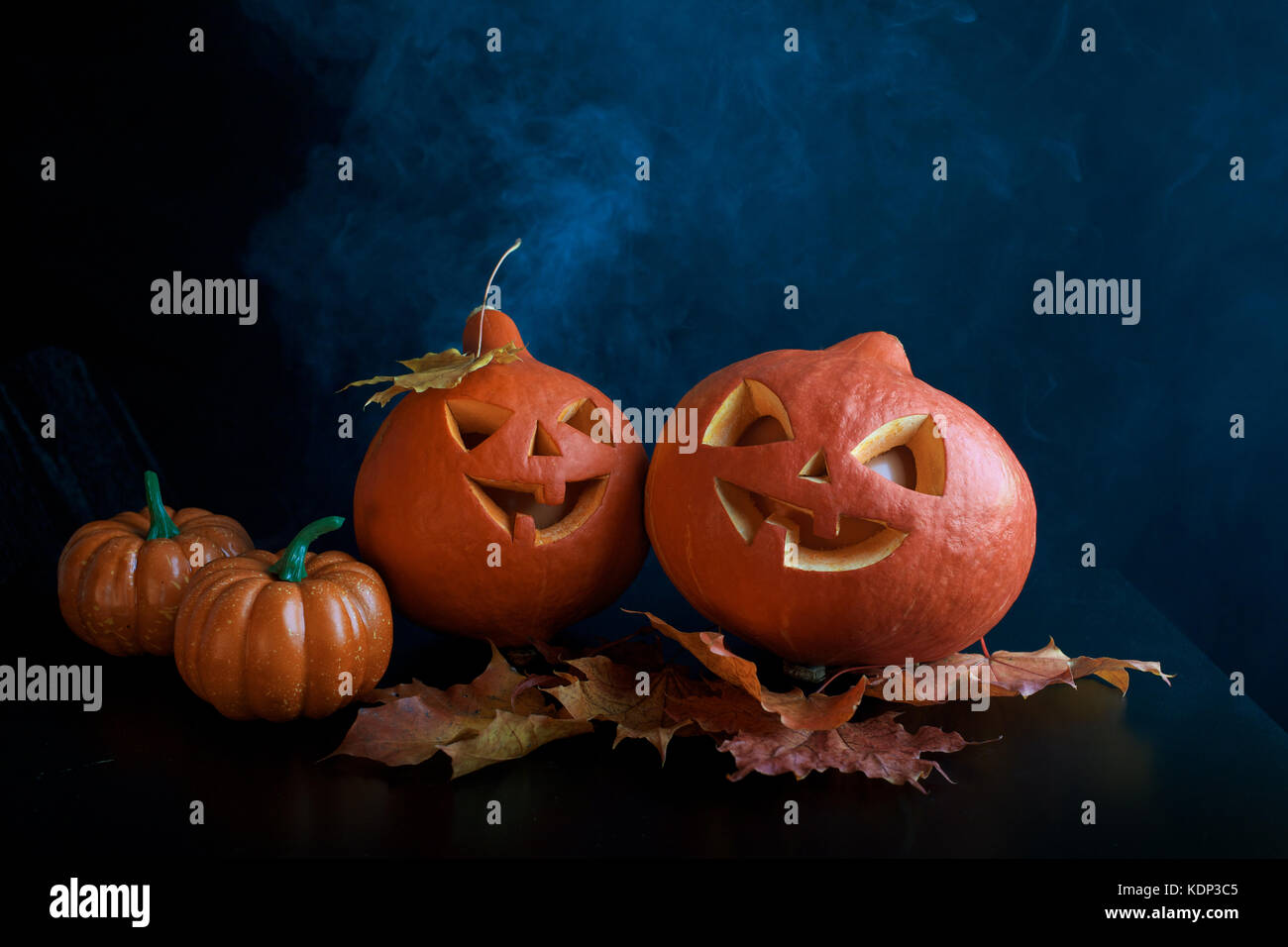 Halloween pumpkins heads jack lantern on dark background Stock Photo ...