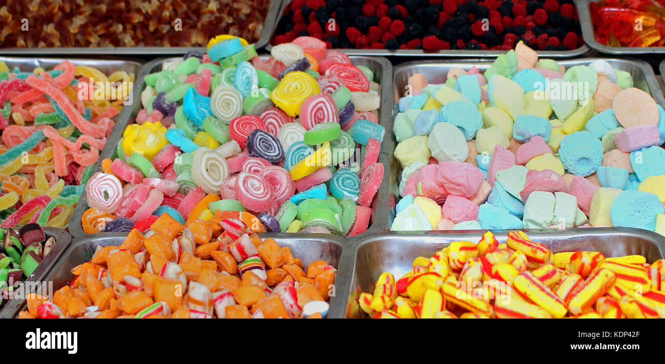 Colorful gummy candy variety on market stall Stock Photo Alamy