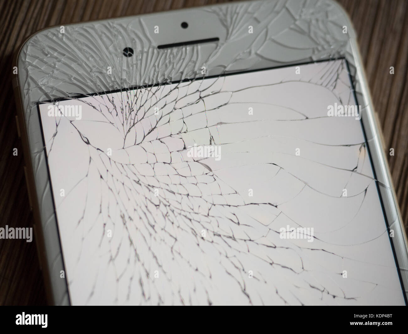 A shattered iPhone 7 Plus screen Stock Photo - Alamy