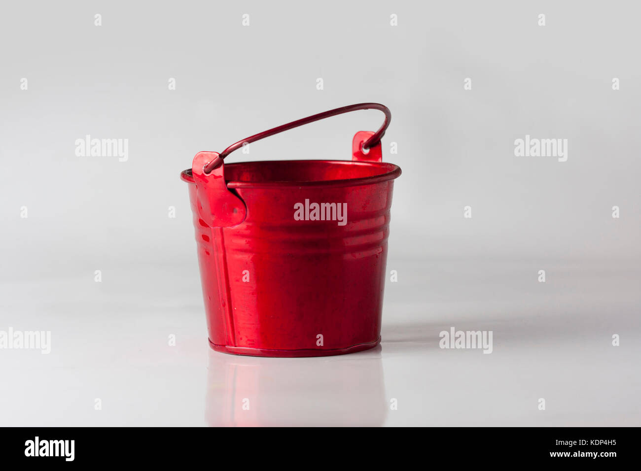 small red plastic buckets