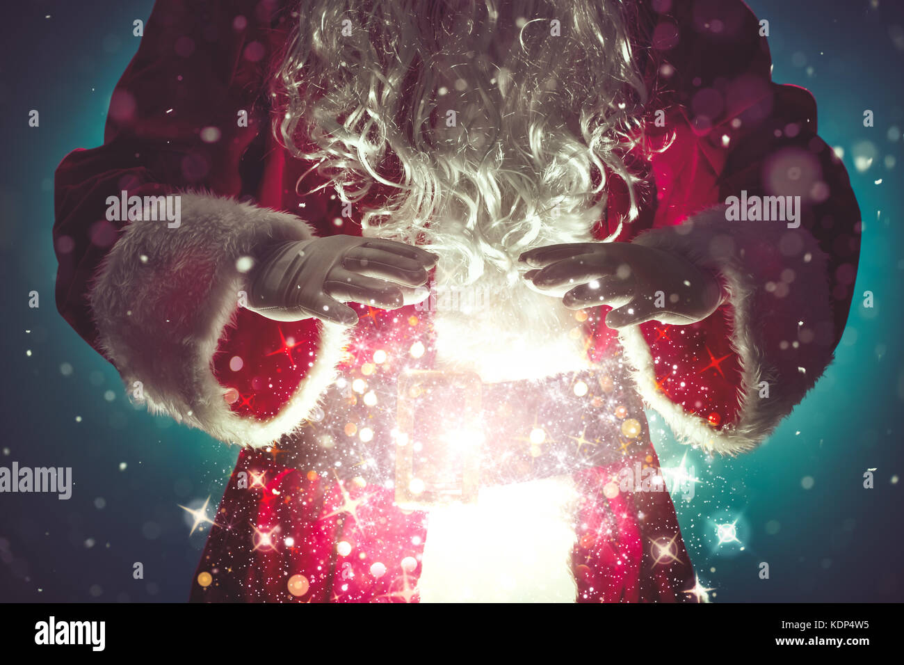 Santa Claus with magic Christmas lights,Christmas concept Stock Photo