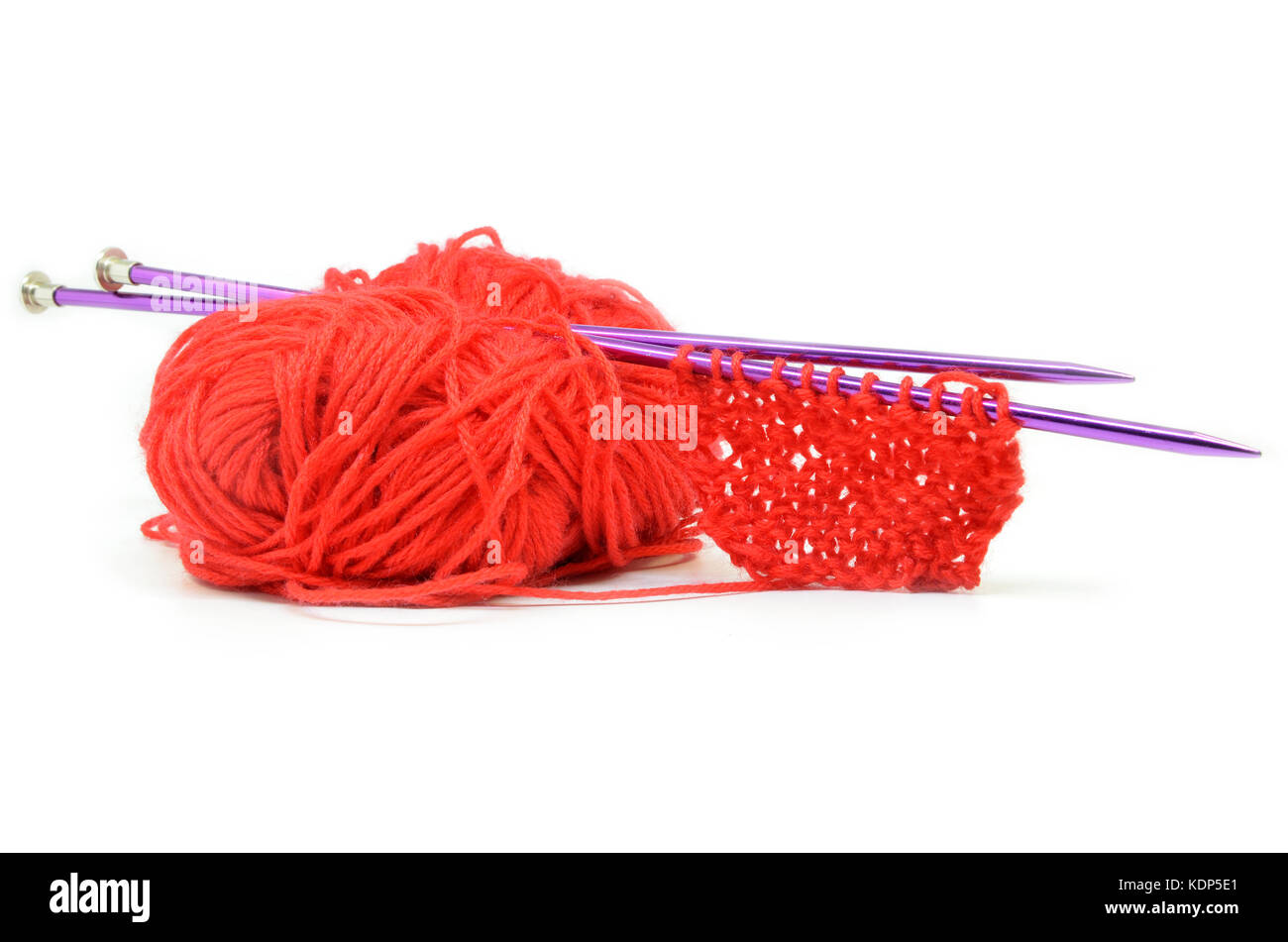Knitting wool and knitting needles on white background Stock Photo - Alamy