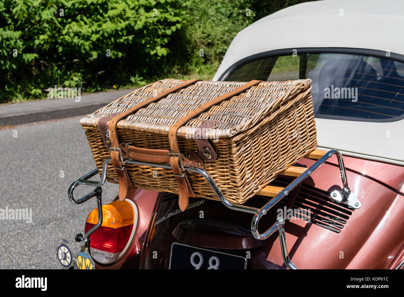A beetle car (Käfer) with a reed basket Stock Photo
