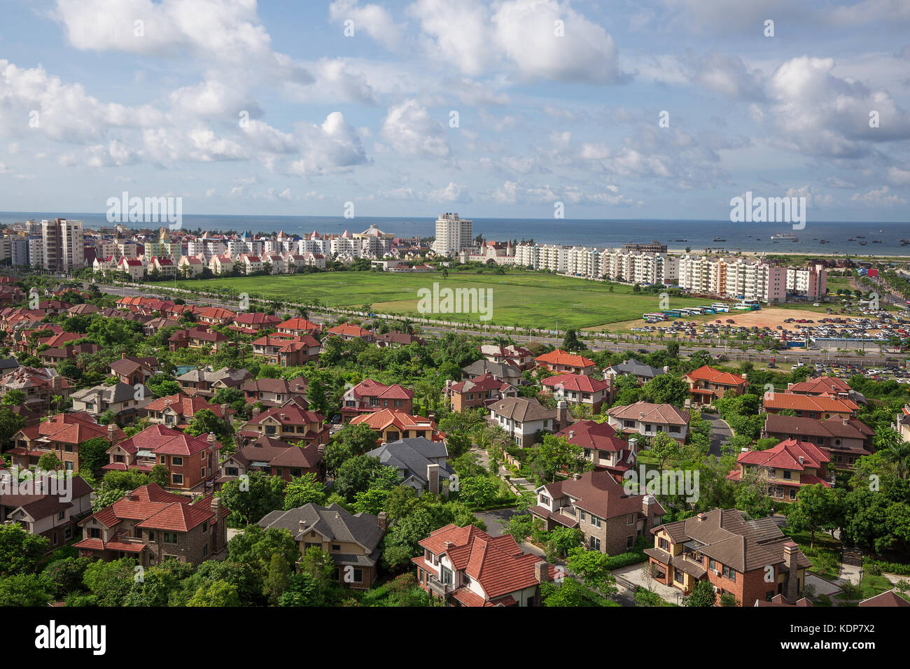 houses under the cloudy sky Stock Photo - Alamy