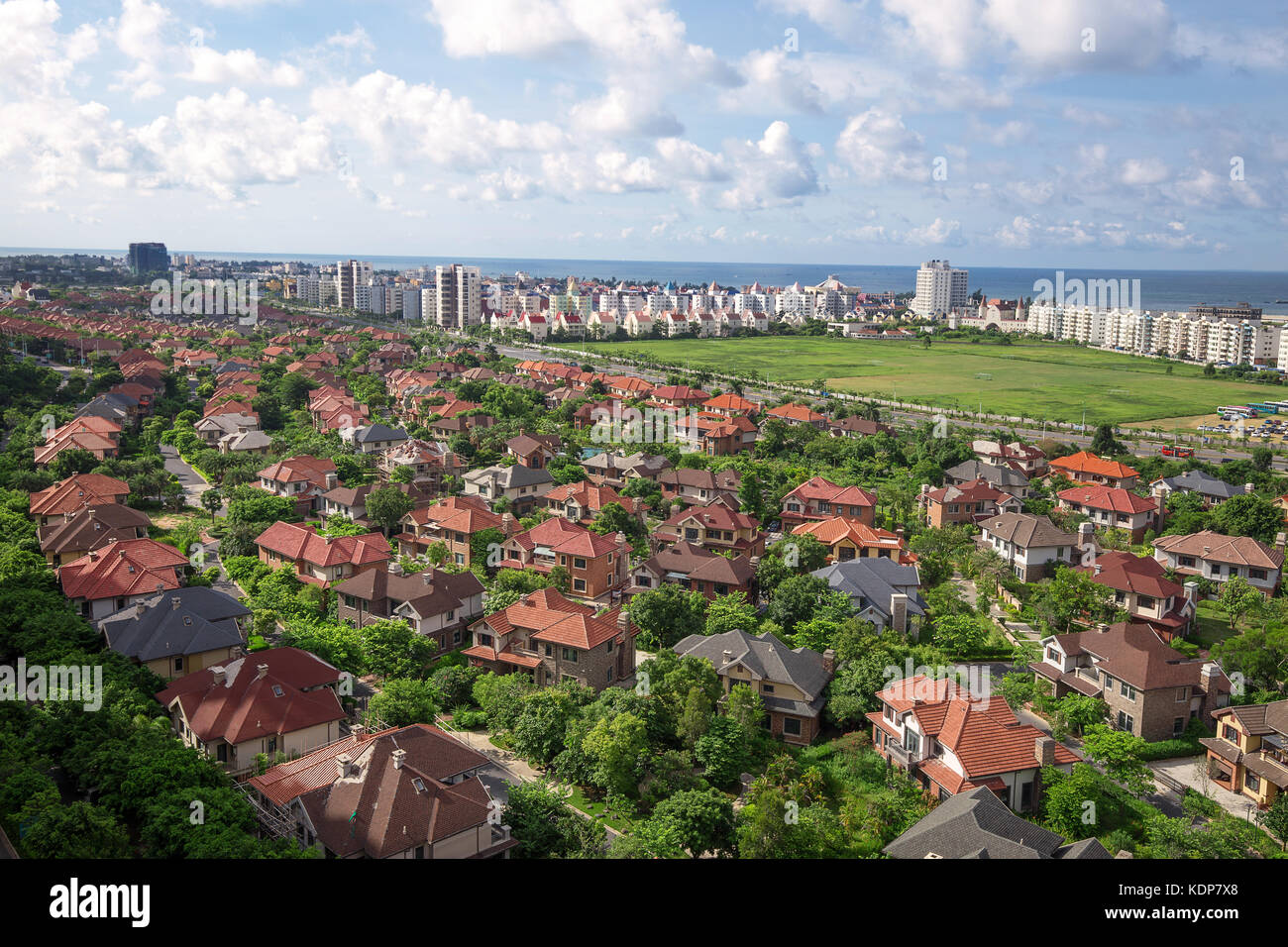 houses under the cloudy sky Stock Photo - Alamy