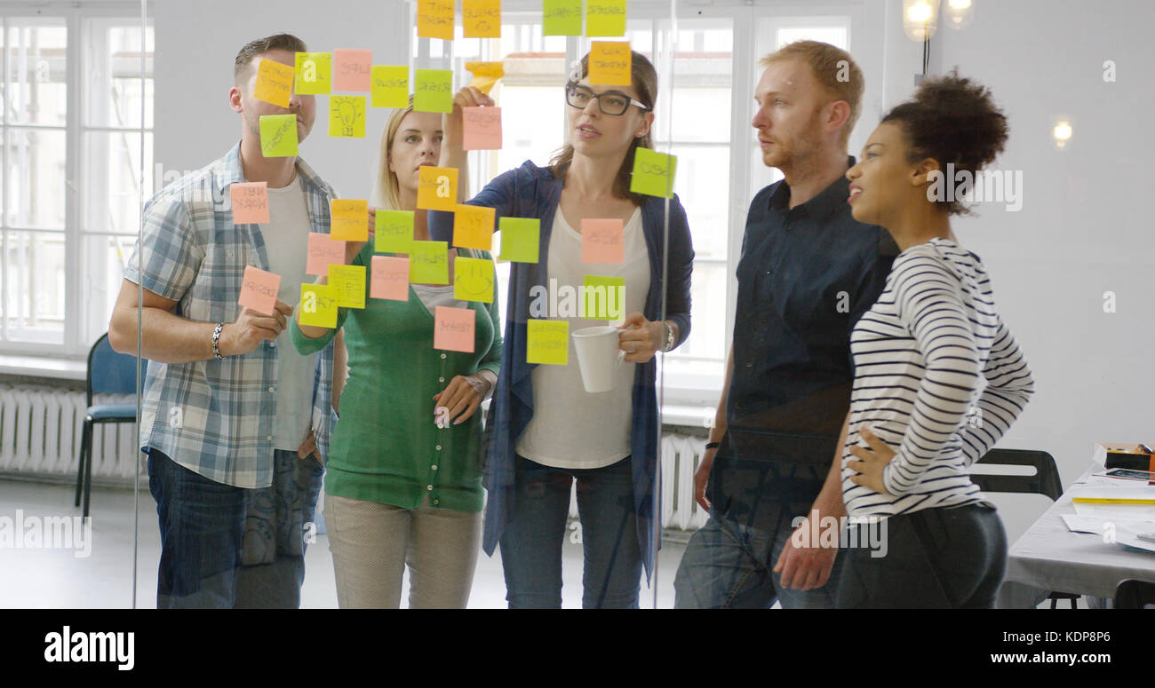 Colleagues working together in modern office Stock Photo