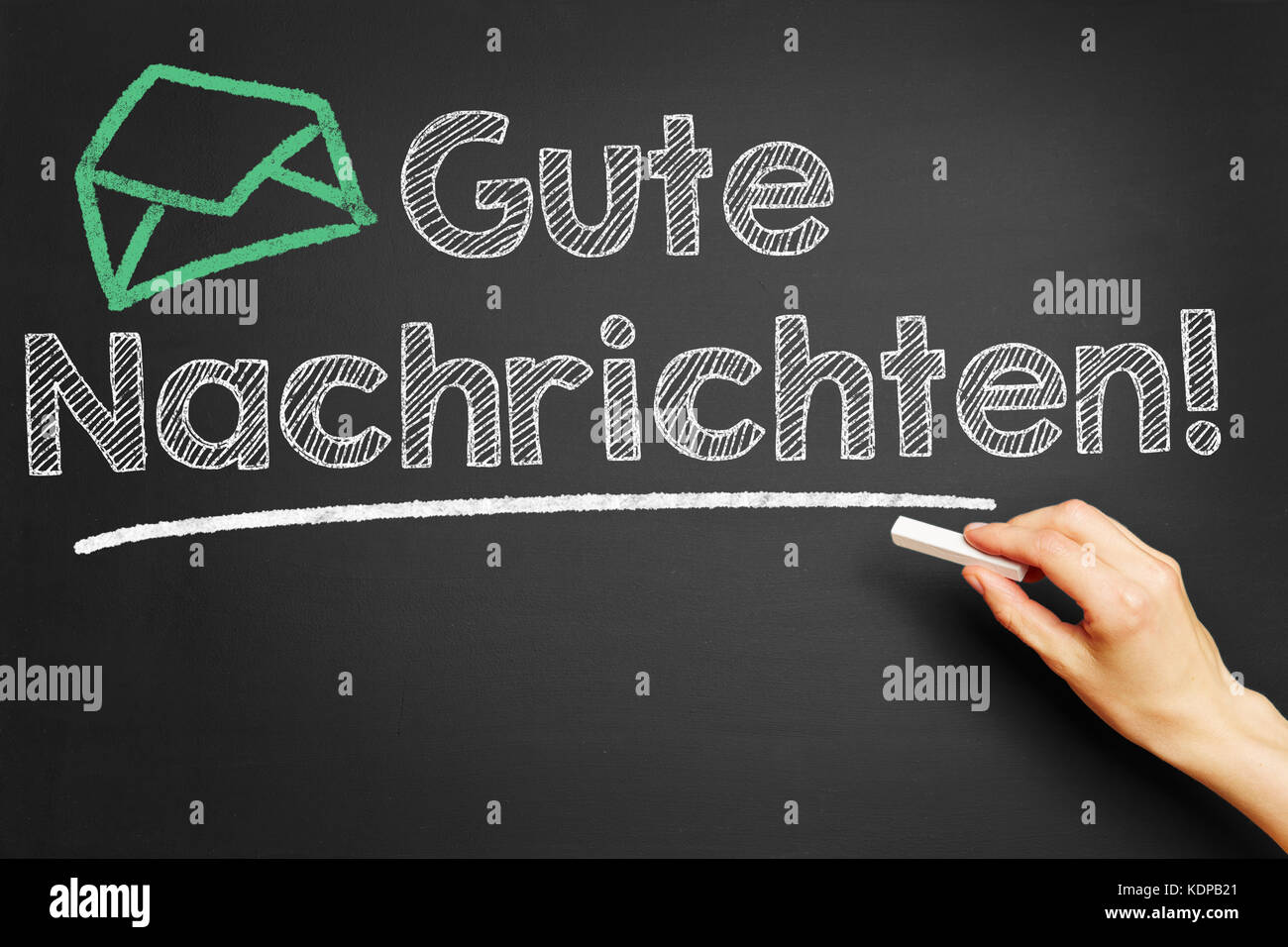 Gute Nachrichten (good news) or message with mail icon on blackboard Stock Photo