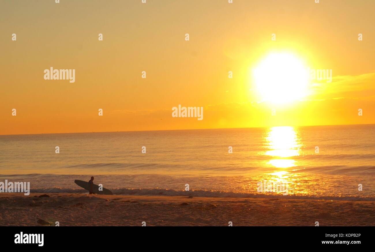 Ocean beach nj sunrise, surfer hi-res stock photography and images - Alamy