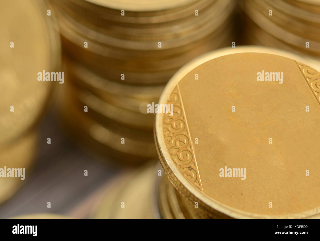 Closeup of Golden Coins Pile - Earning concept. Stock Photo