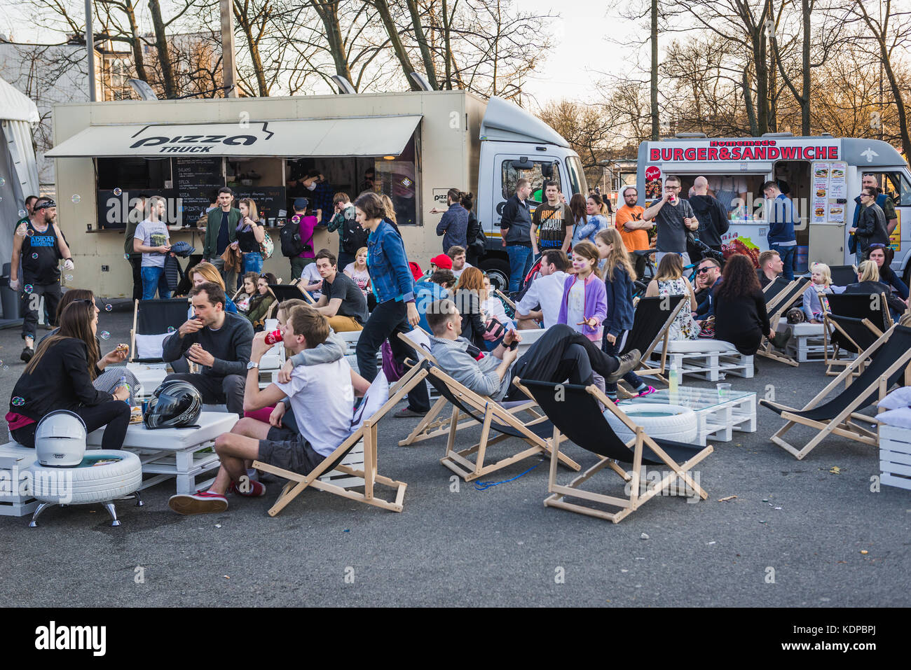 Pizza and burger food trucks on a Food Truck festival in Warsaw, Poland
