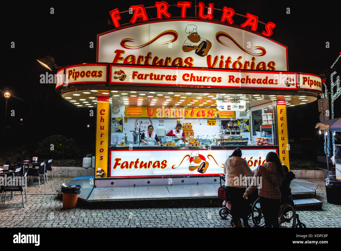 Food booth with Portuguese doughnuts called Farturas in Vila Nova de ...