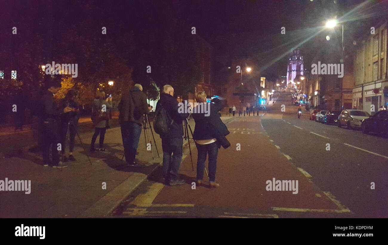 Taking photographs at night,looking up Park Street from the bottom of the hill on College Green in Bristol. Robert Timoney/Alamy/Stock/Image Stock Photo