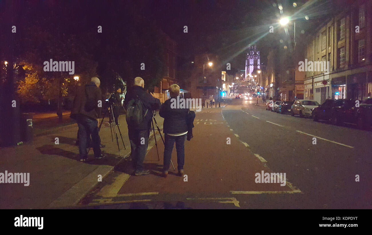 Taking photographs at night,looking up Park Street from the bottom of the hill on College Green in Bristol. Robert Timoney/Alamy/Stock/Image Stock Photo