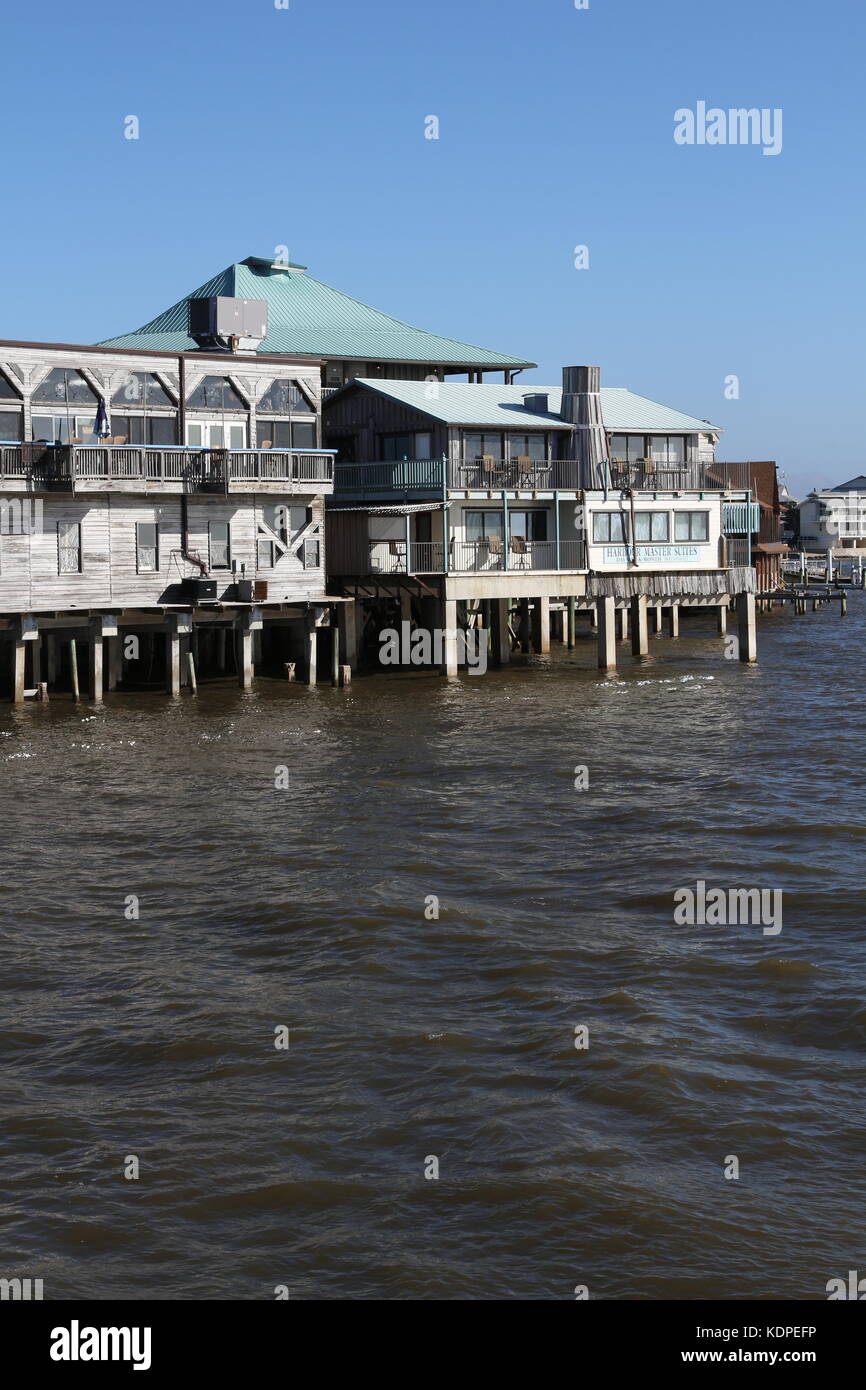 Historic waterfront buildings on stilts in Cedar Key, FL. Cedar Key is
