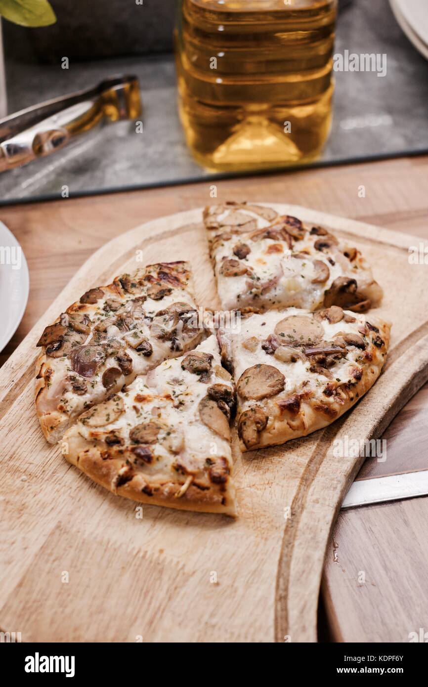 Tasty And Fresh Italian Pizza In The Kitchen On The Wooden Board Stock Photo Alamy