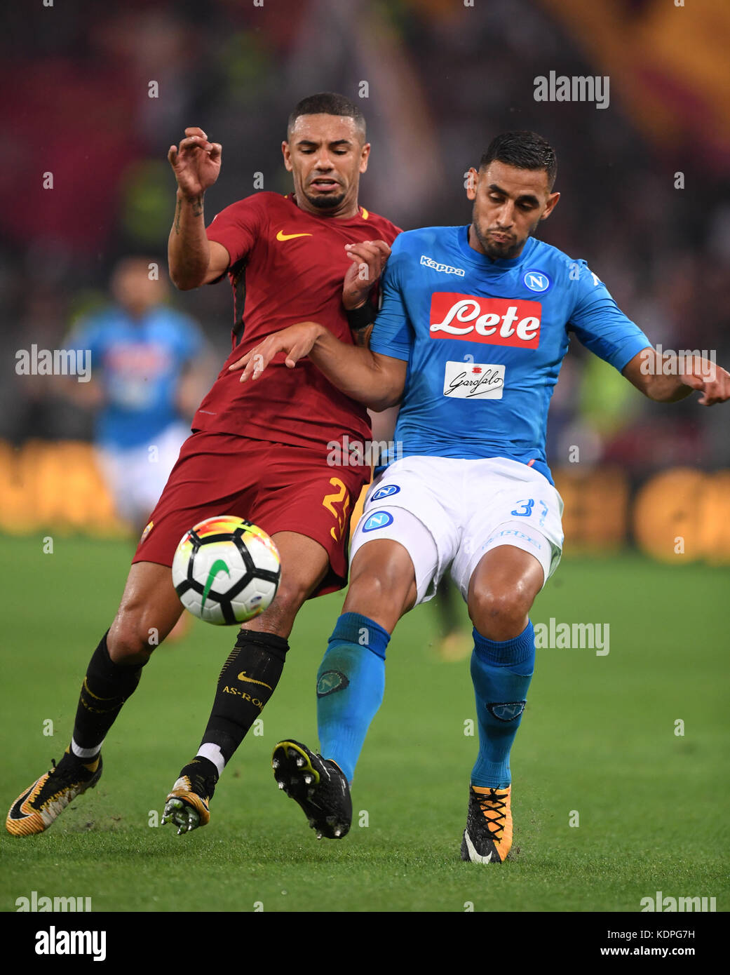 Roma, Italy. 14th Oct, 2017. Roma's Bruno Reres (L) vies with Napoli's Faouzi Ghoulam during a Serie A soccer match between Roma and Napoli in Rome, Italy, Oct. 14, 2017. Napoli won 1-0. Credit: Alberto Lingria/Xinhua/Alamy Live News Stock Photo