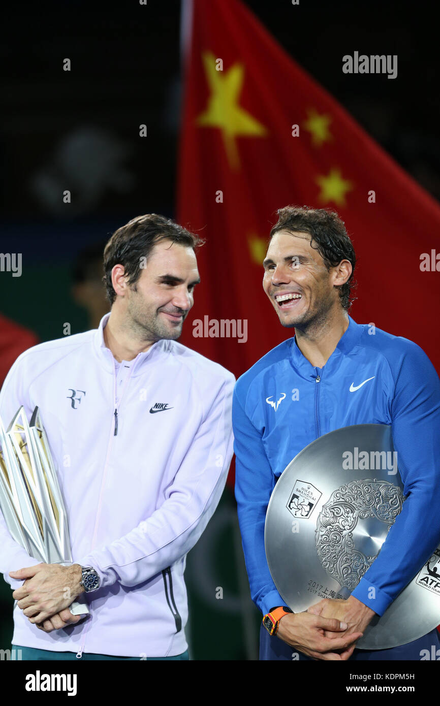Shanghai, China. 15th Oct, 2017. Winner Roger Federer (L) of Switzerland  talks to runner-up Rafael Nadal of Spain in the victory ceremony of 2017  ATP Shanghai Masters tennis tournament in Shanghai, east