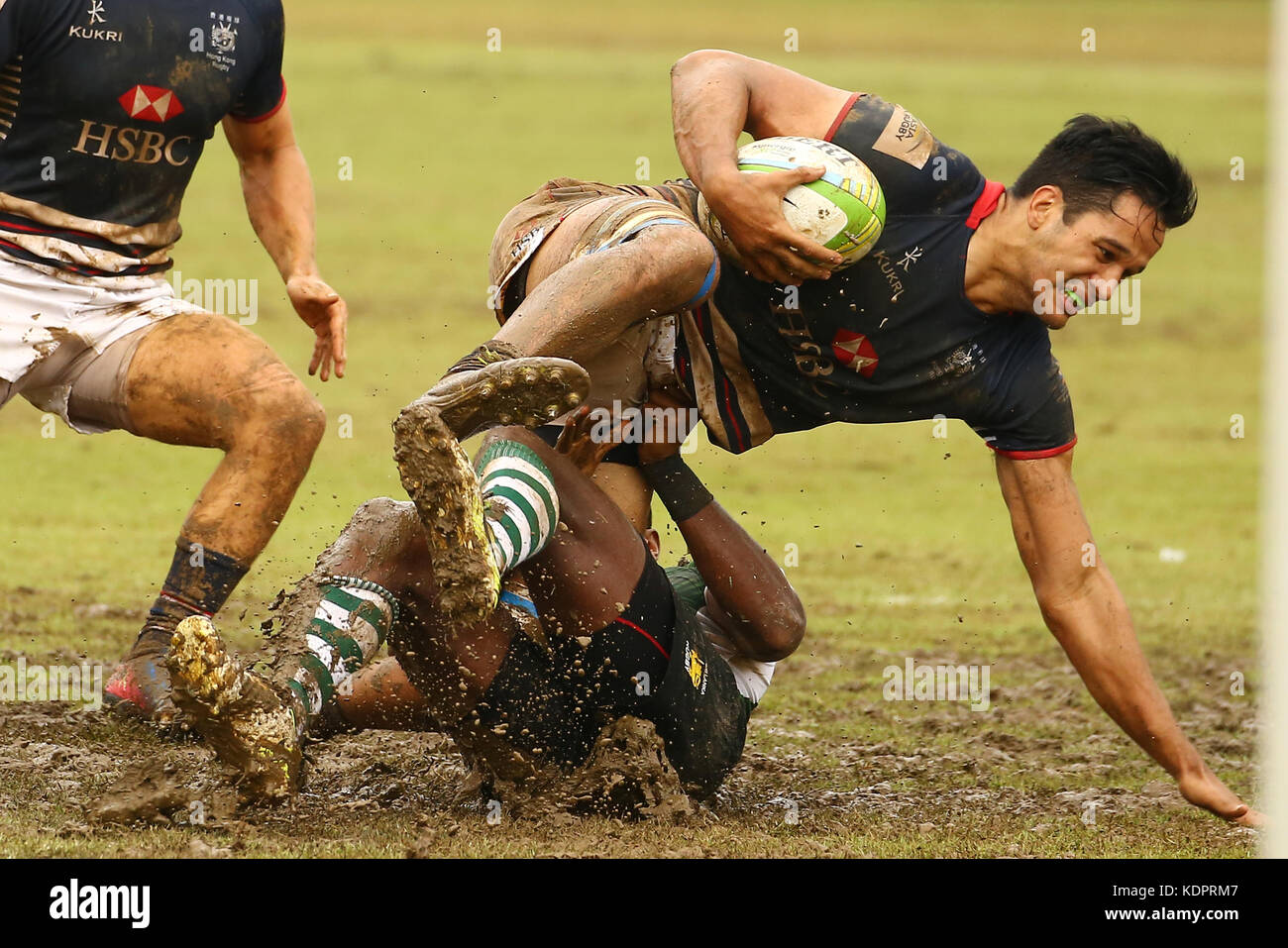 Colombo, Sri Lanka. 15th Oct, 2017. Hong Kong  player is tackled by Sri Lankan  Player during the Asia Rugby Sevens 2017  match between Sri Lanka and Hong Kong at Racecourse International Rugby Stadium Colombo on 15 October 2017 in Sri Lanka. Credit: Vimukthi Embuldeniya/Alamy Live News Stock Photo