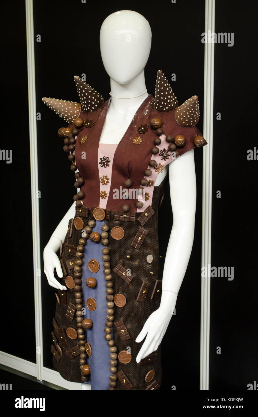 The Chocolate Show 2017 at Olympia. Chocolate couture on display. Dress designed by Maxime G and Elise Chalmin. Chocolate fans descended en masse for The Chocolate Show, 13th-15th October 2017, at Olympia, London, UK, which ended today. Featuring a wide range of exhibitors selling everything chocolate from around the world, tastings, demonstrations by leading chefs and chocolatiers, and chocolate art and fashion displays, the show experienced high visitor numbers across all three days. 15th October 2017. Credit: Antony Nettle/Alamy Live News Stock Photo