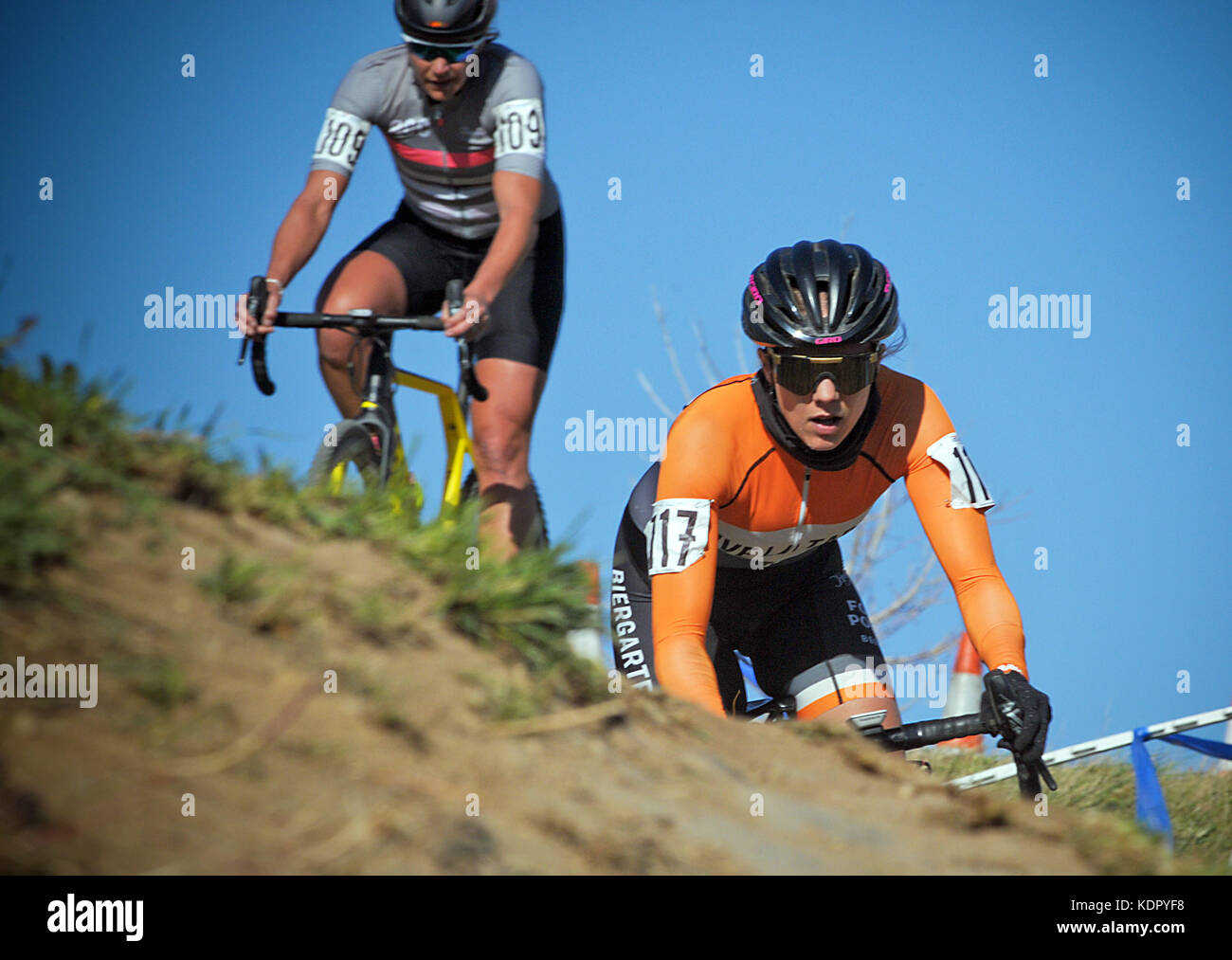 October 14, 2017 - Women's elite cyclists need total concentration as they enter the steep and difficult off-camber section of the U.S. Open of Cyclocross, Valmont Bike Park, Boulder, Colorado. Stock Photo