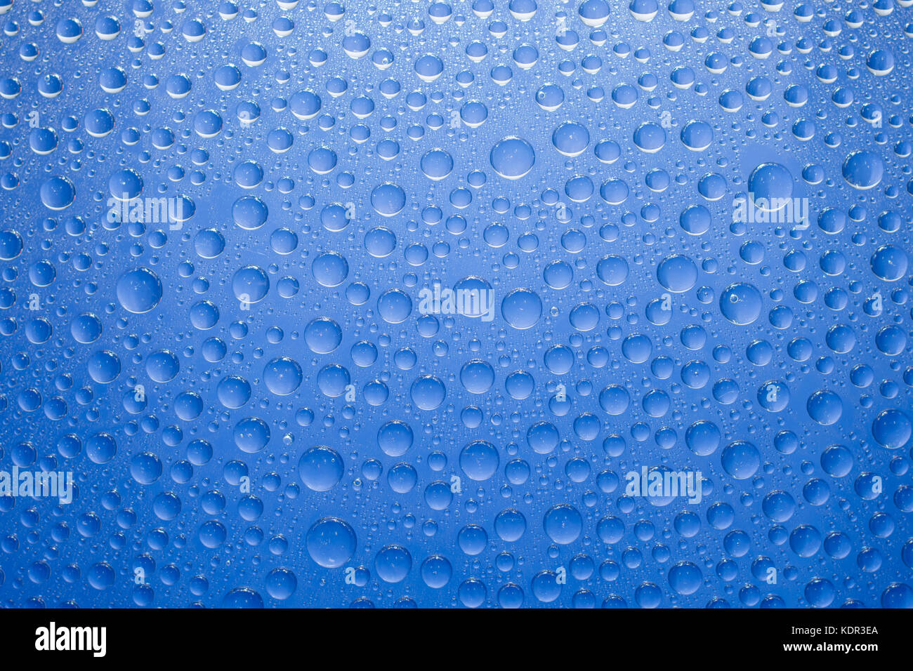 Water drops blue background. Water drops on glass background Stock ...