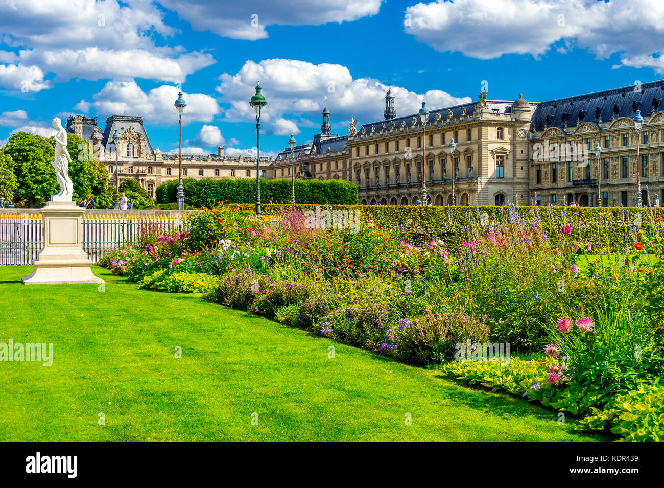 Statues within the Jardin Tuileries (Tuileries Garden), and the beautiful architecture of the