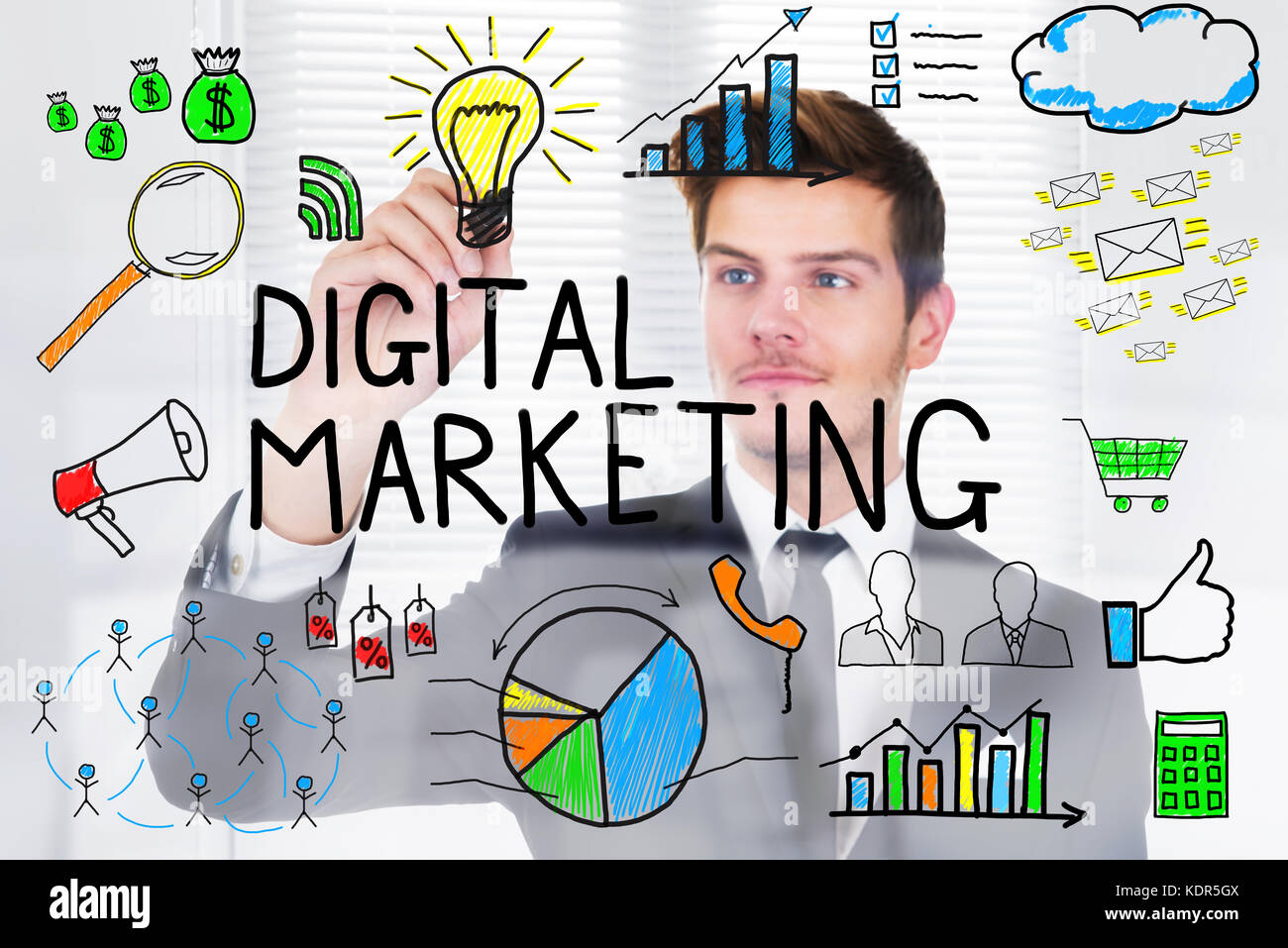 Successful Businessman Drawing Digital Marketing Concept On Transparent Glass In Office Stock Photo