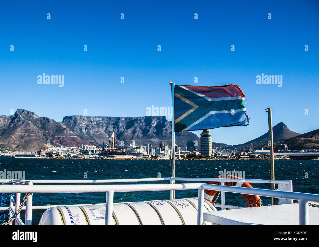 The flags of South Africa is blowing in the Wind in front of the Table  Mountain in Cape Town in South Africa Stock Photo - Alamy