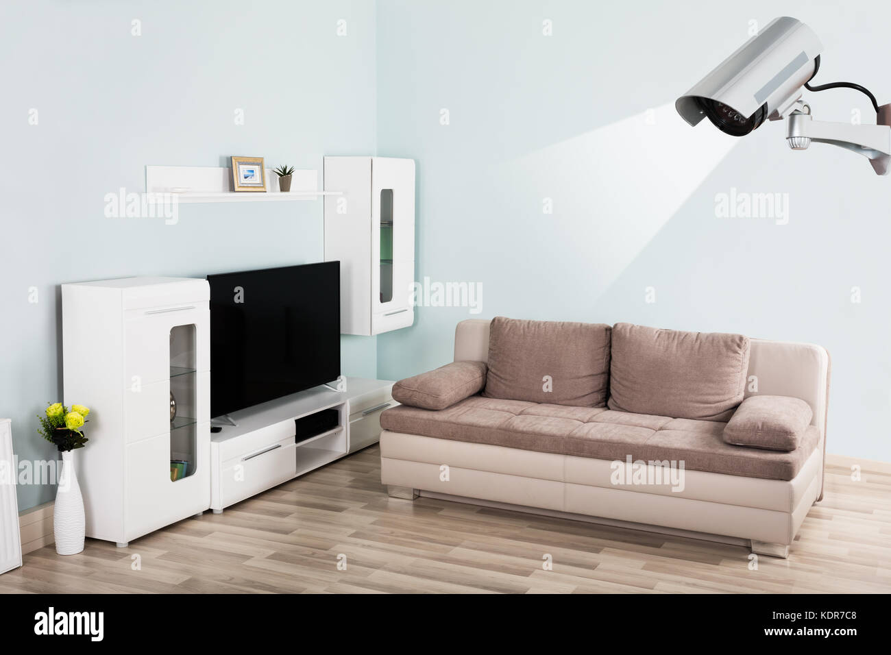 Interior Of Modern Empty Living Room With Security Camera In