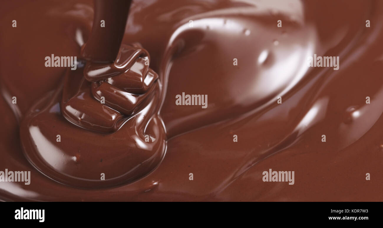 pouring dark melted chocolate Stock Photo - Alamy