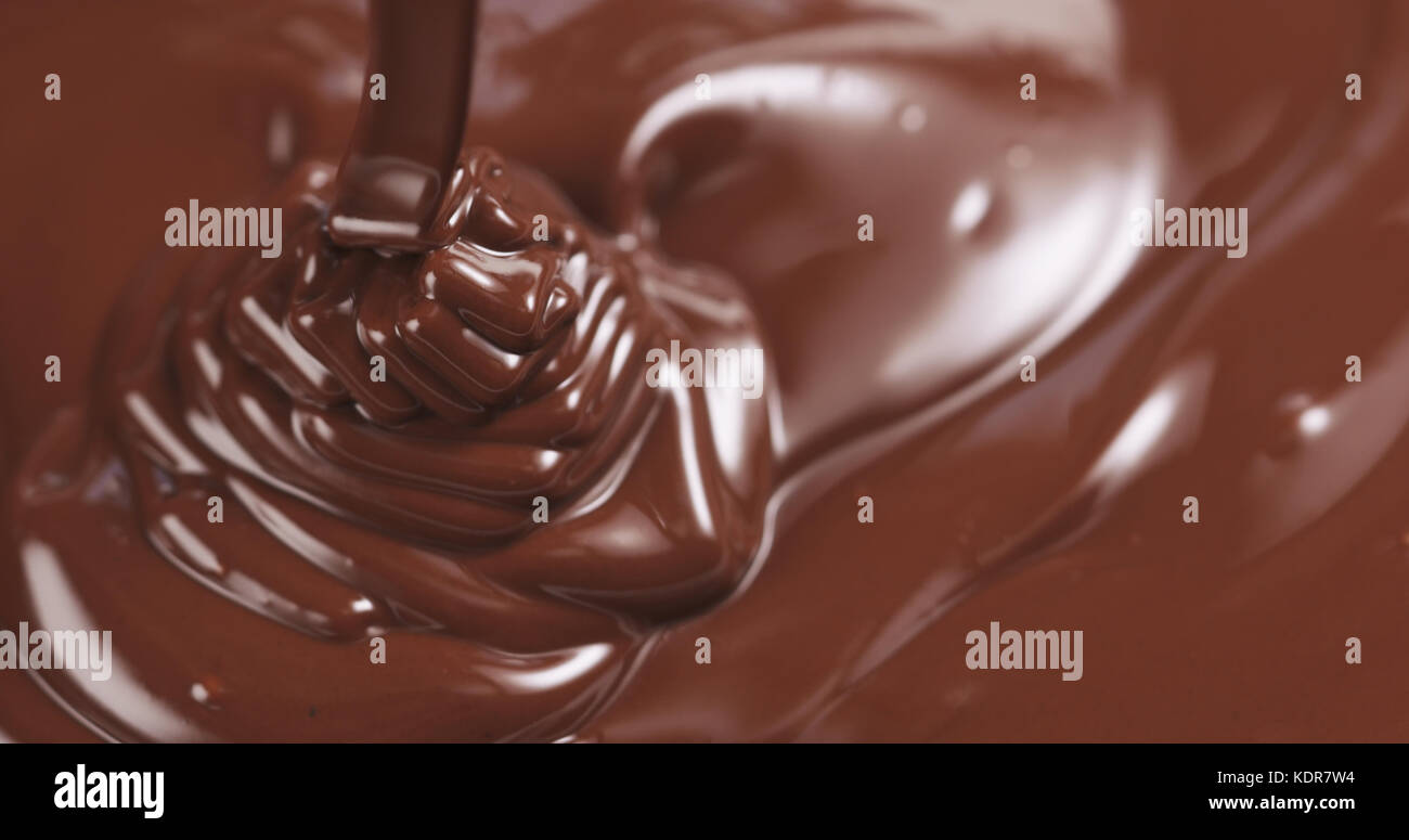 pouring dark melted chocolate Stock Photo - Alamy