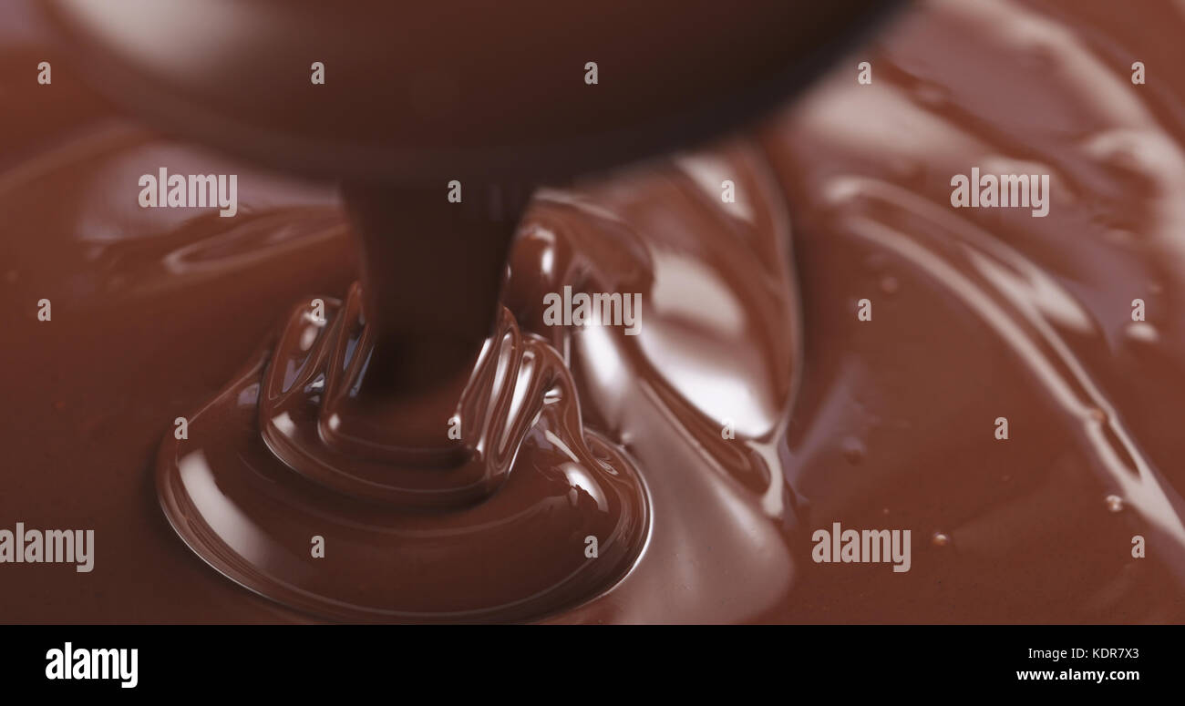 pouring dark melted chocolate Stock Photo - Alamy