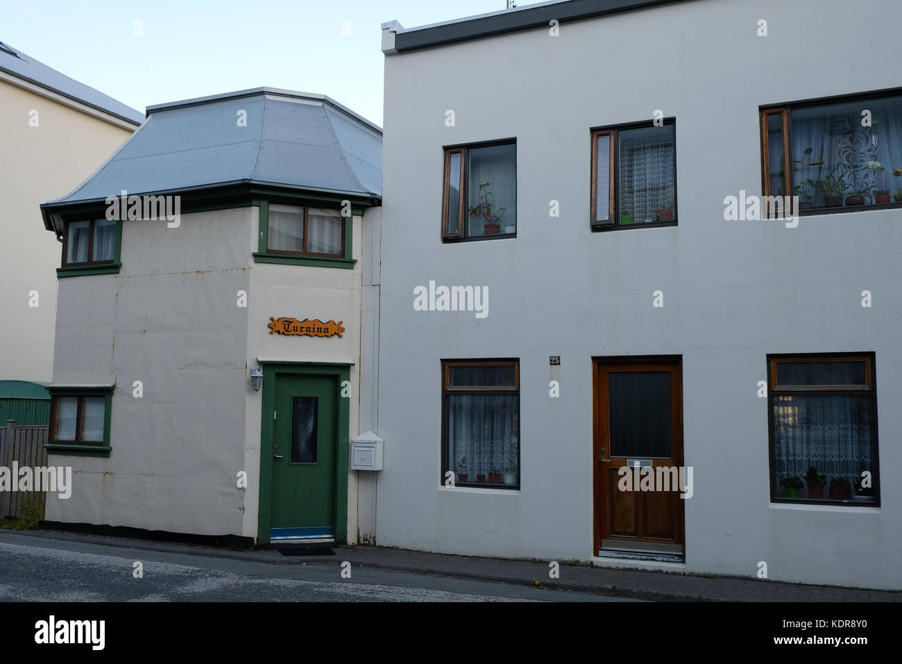 Traditional Icelandic architecture and white residential housing ...