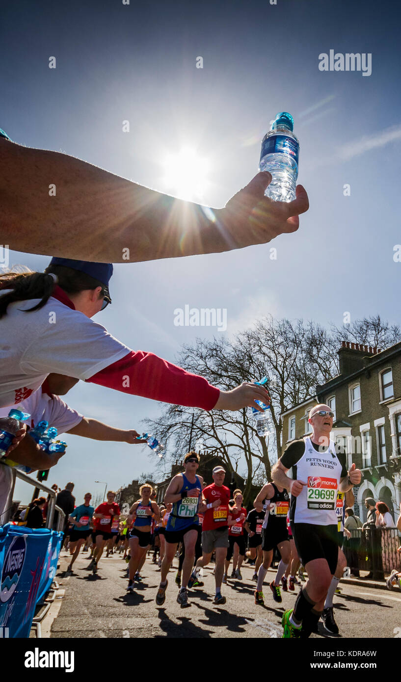 Runners during 33rd London Marathon, UK. Stock Photo