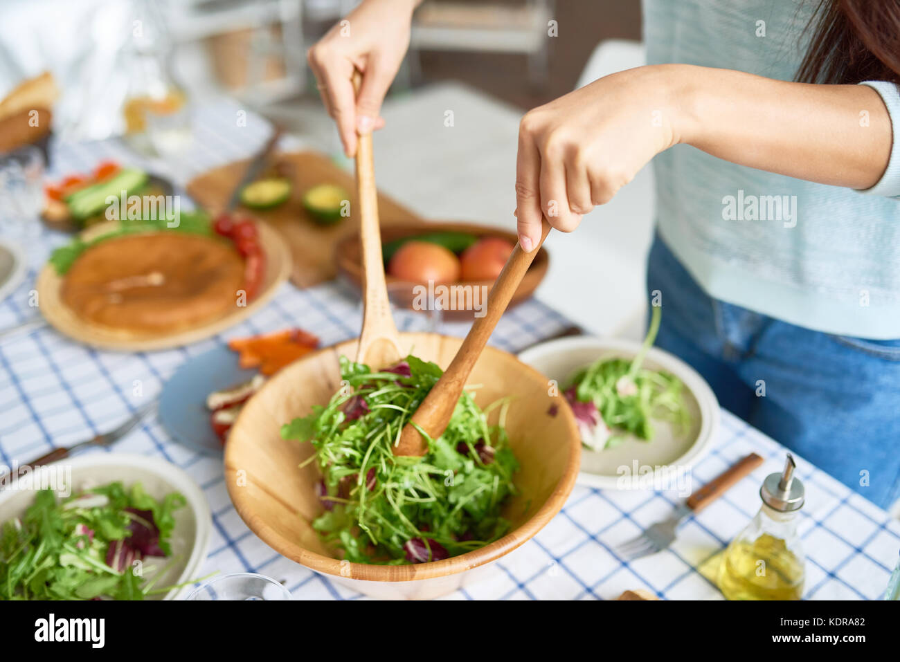 Young Woman Mixing Salad Closeup Stock Photo Alamy