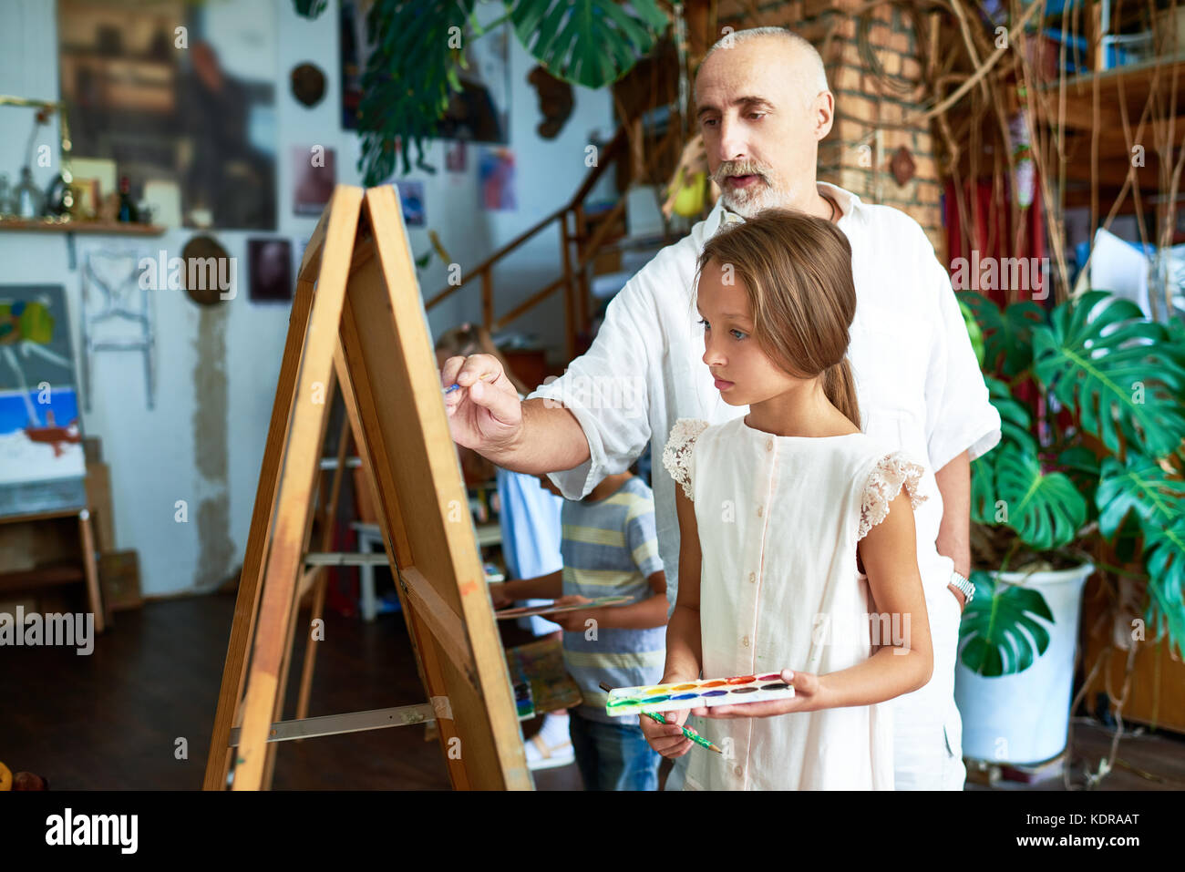 Senior Art Teacher in School Stock Photo Alamy
