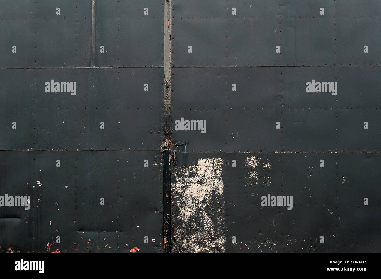 Black Riveted Sheet Metal Door Background Stock Photo Alamy