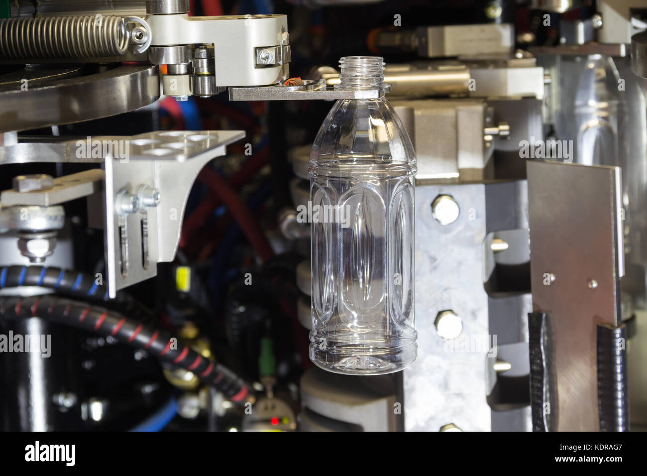 PET bottles blowing. The plastic bottle blowing machine.Heating process