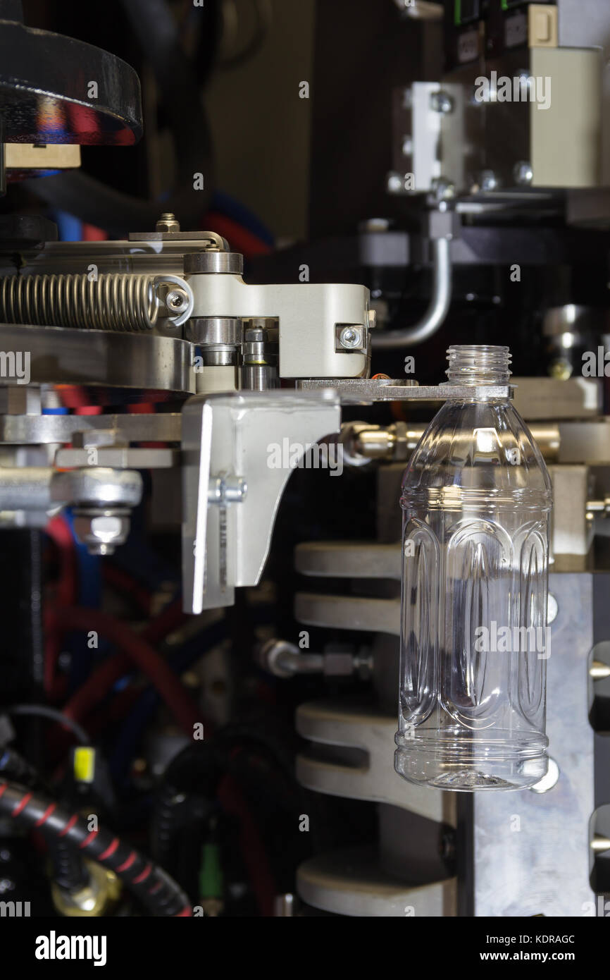 PET bottles blowing. The plastic bottle blowing machine.Heating process