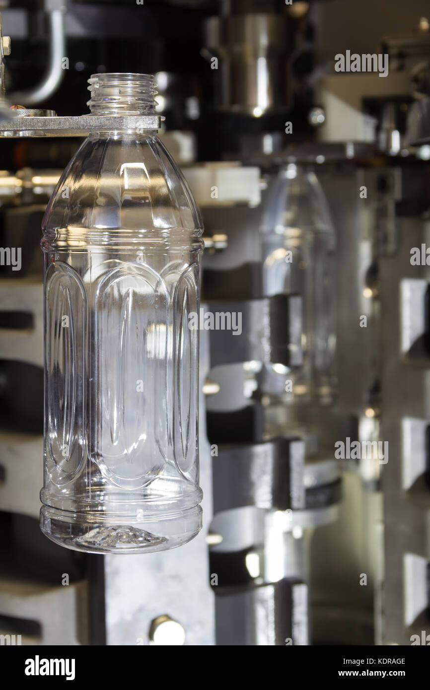 PET bottles blowing. The plastic bottle blowing machine.Heating process