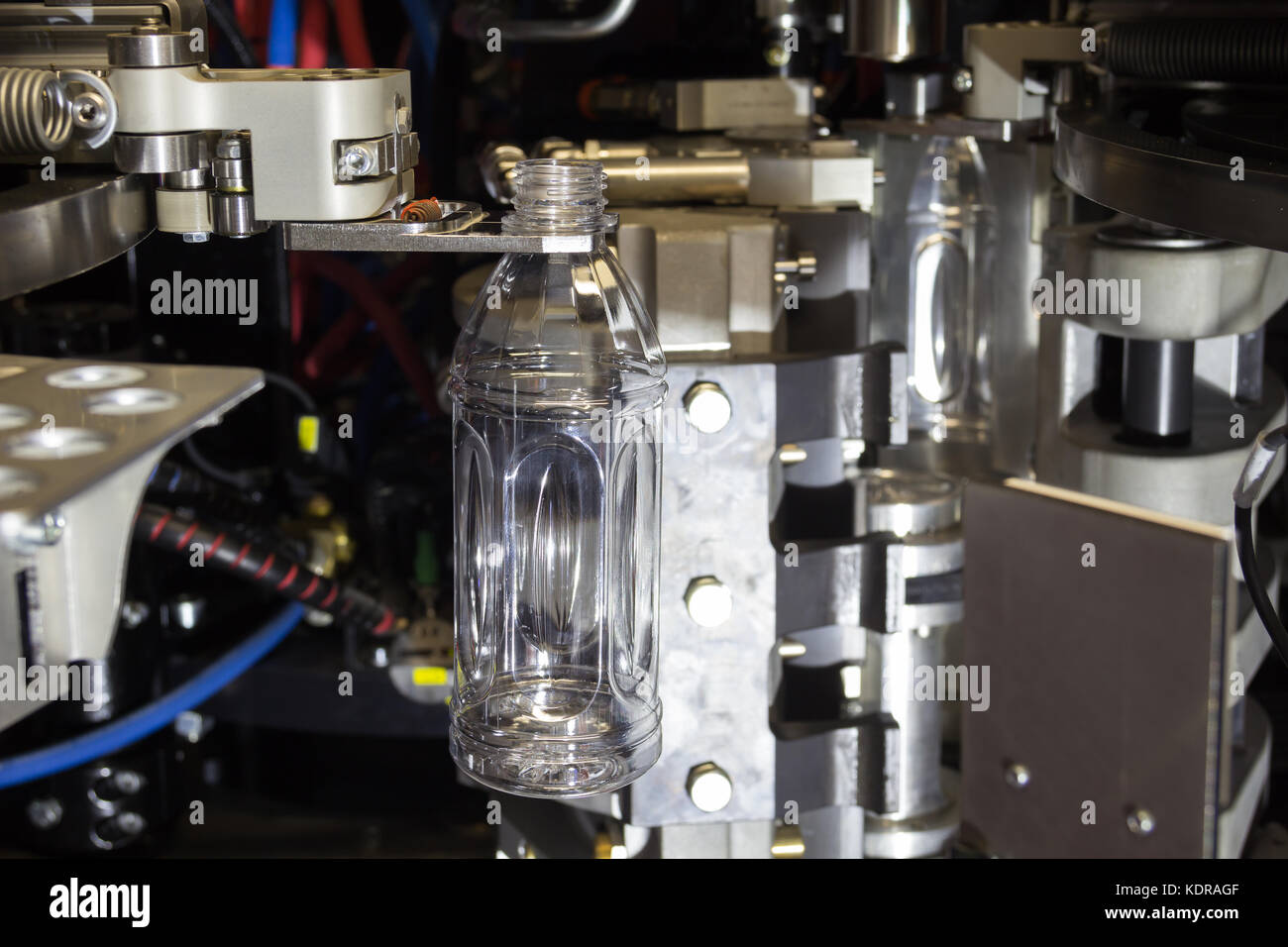 PET bottles blowing. The plastic bottle blowing machine.Heating process