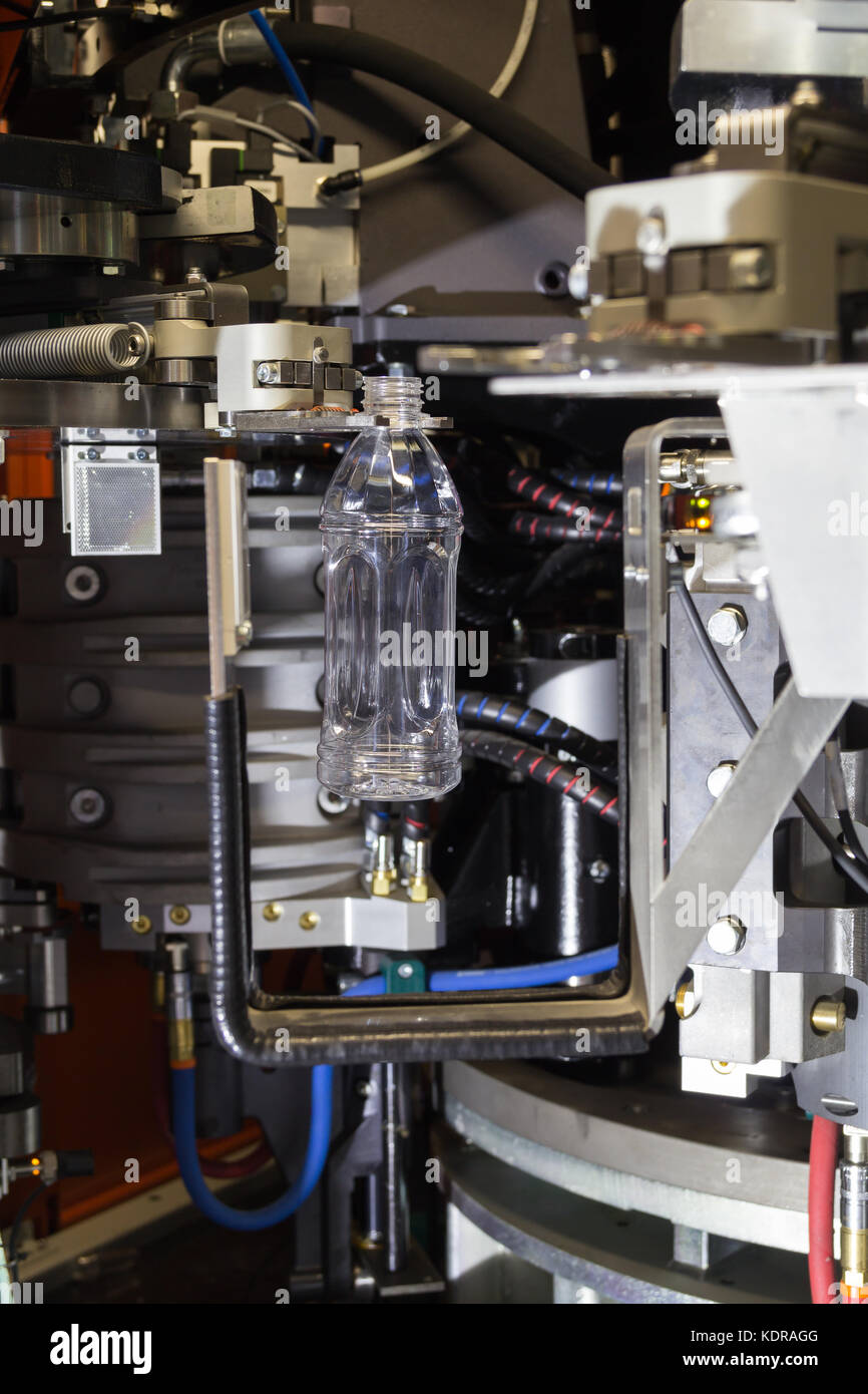 PET bottles blowing. The plastic bottle blowing machine.Heating process