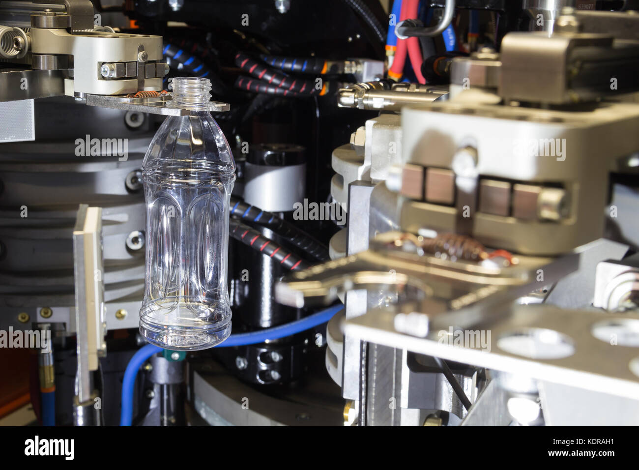 PET bottles blowing. The plastic bottle blowing machine.Heating process